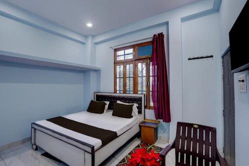 Ένα ή περισσότερα κρεβάτια σε δωμάτιο στο Hotel O AK PALACE