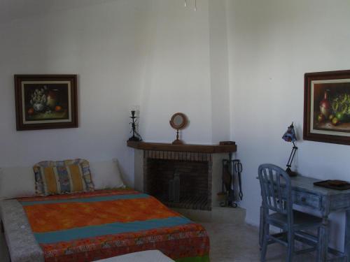 Ein Bett oder Betten in einem Zimmer der Unterkunft Casa de la Playa