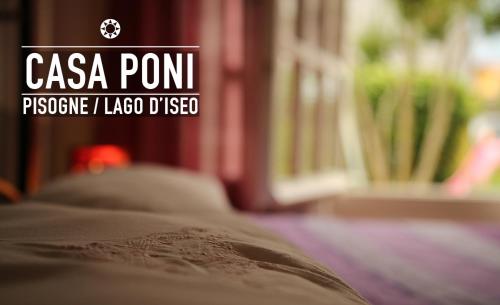 a close up of a bed in a room at Casa Poni in Pisogne