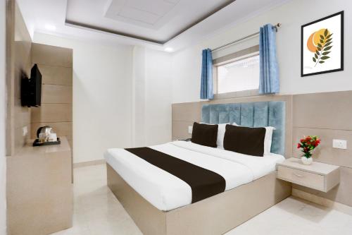 Katil atau katil-katil dalam bilik di Super Hotel O Heera Nagar Formerly Cosy stay