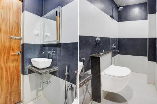 a bathroom with a toilet and a sink at Super Townhouse Bela Road Varanasi City Railway Station Formerly Srijan Grand in Varanasi