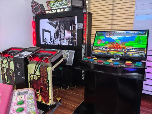 a video game system and a video game console at Grand Suite at Mamanorms' Farm 