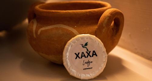 Πιστοποιητικό, βραβείο, πινακίδα ή έγγραφο που προβάλλεται στο Xaxa Lodge