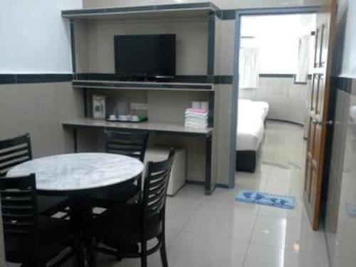 Cucina o angolo cottura di Burmahtel Hotel