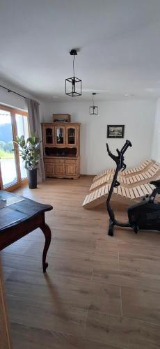 a room with a gym with a exercise bike at Savinjski raj in Mozirje