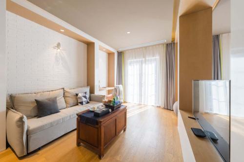 Posezení v ubytování Wangting Jinxiu Hotel