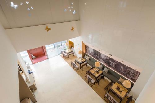 Posezení v ubytování Wangting Jinxiu Hotel
