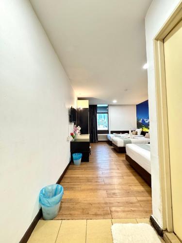 Кровать или кровати в номере Swiss Hotel Kuala Lumpur