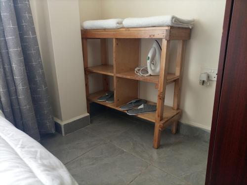 Ein Bett oder Betten in einem Zimmer der Unterkunft Ikulu