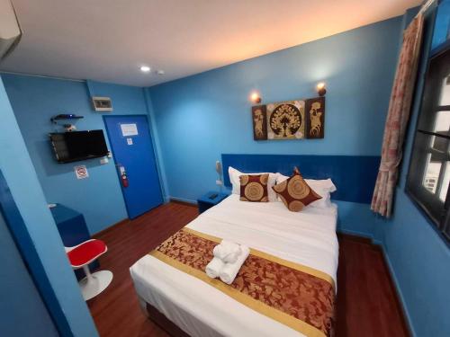 Giường trong phòng chung tại Wow Guesthouse