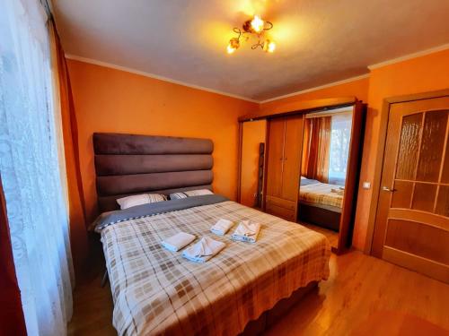 Ένα ή περισσότερα κρεβάτια σε δωμάτιο στο Kandavas 21