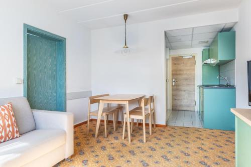 Ein Sitzbereich in der Unterkunft IFA Schöneck Hotel & Ferienpark