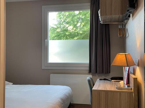 Hotel Ecluse 34にあるベッド