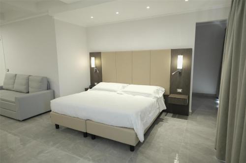 Best Western Grand Hotel Catanzaroにあるベッド