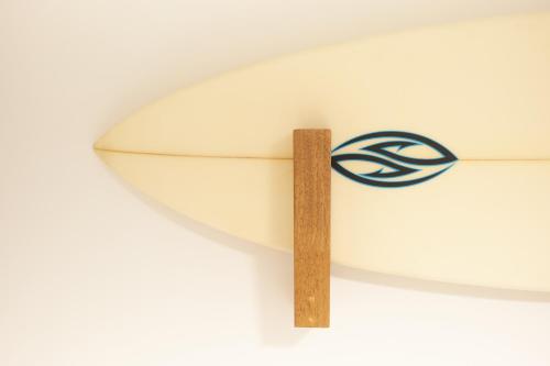 a close up of a surfboard with a wooden stick at Z LAND Enoshima in Fujisawa