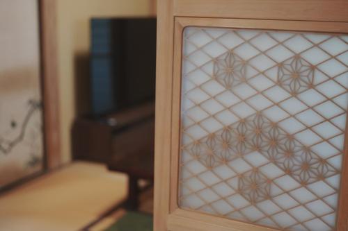 a glass door with a window in a room at Enishienoyado Ichihara - Vacation STAY 16539v in Ichihara
