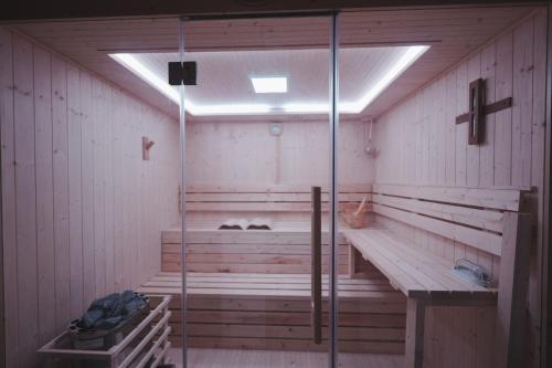 a sauna with a bench and a cross on the wall at Enishienoyado Ichihara - Vacation STAY 16539v in Ichihara