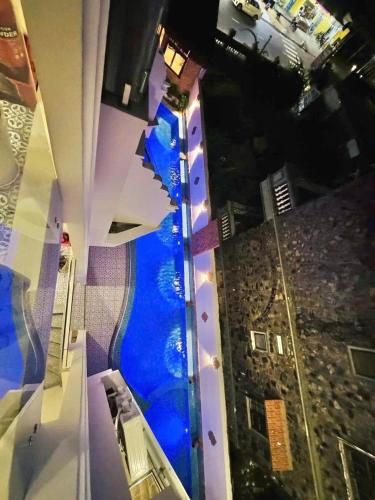 an overhead view of a water slide in a building at Cham Charm Home Mui Ne in Mui Ne