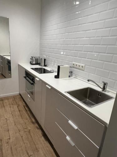 Dapur atau dapur kecil di Kleines Apartment in schönster Lage