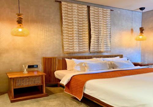 Кровать или кровати в номере The Salt Boutique Hotel by Wyns