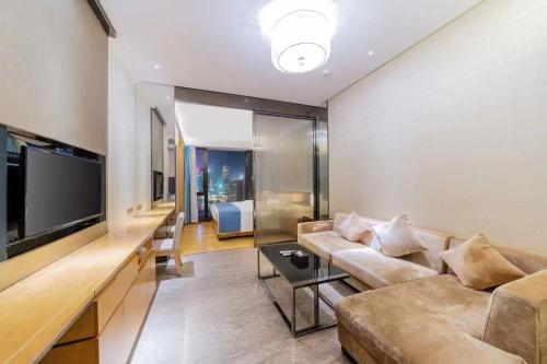 TV/Unterhaltungsangebot in der Unterkunft Yizhimei Light Residence