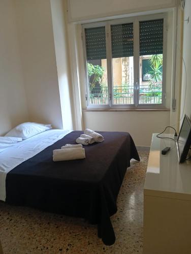 Cama o camas de una habitación en B&B Sansevero Naples