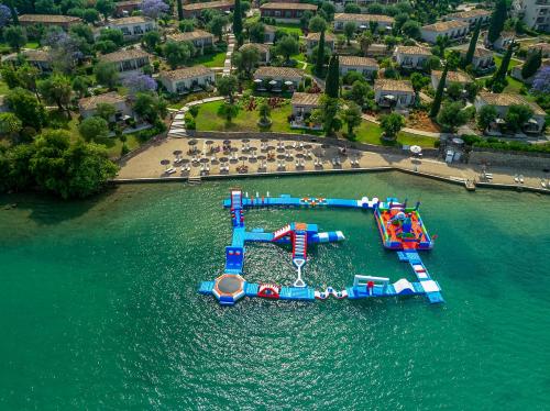 an aerial view of an amusement park in the water at Dreams Corfu Resort & Spa - All Inclusive in Gouvia