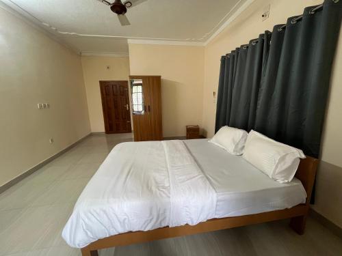 Cama o camas de una habitación en Belle Vue Homestay