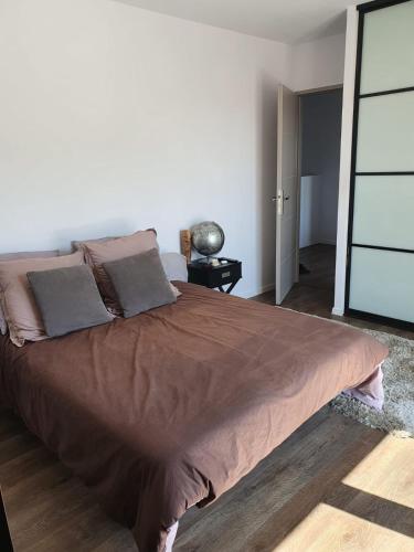 Llit o llits en una habitació de Villa d'Architecte