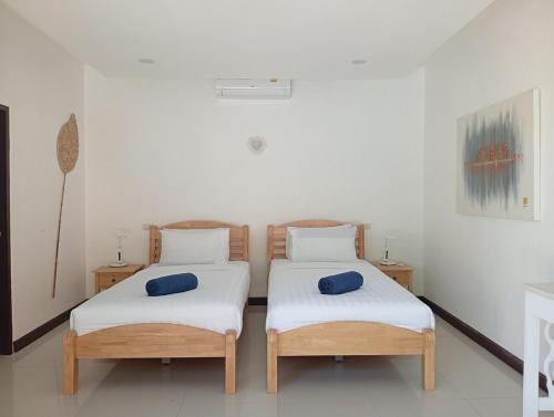 Postel nebo postele na pokoji v ubytování Villa Ravenala
