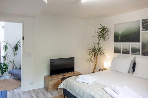 Postel nebo postele na pokoji v ubytování Orléans - Le Green Mood