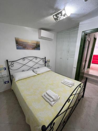 Katil atau katil-katil dalam bilik di Accogliente casa a due passi dal mare.