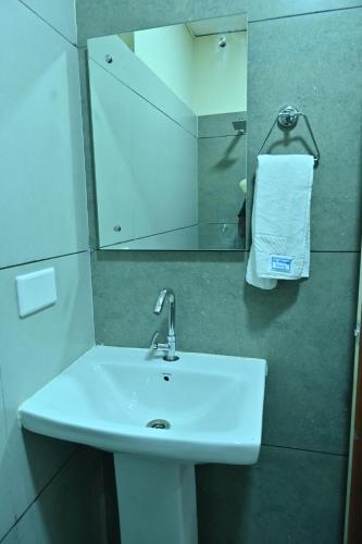 Koupelna v ubytování Mysore Heritage INN