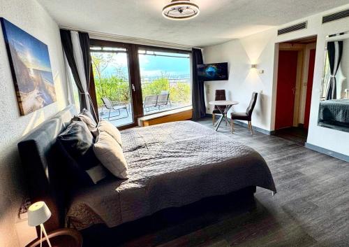 Katil atau katil-katil dalam bilik di Penthouse Apartment Zentral mit Goldstadtblick