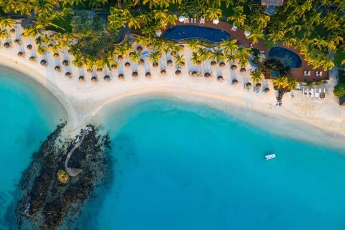 an aerial view of an island with a resort at Royal Palm Beachcomber Luxury in Grand Baie
