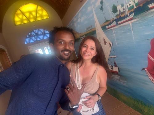 a man and a woman posing for a picture at Karma Kono in Abu Simbel