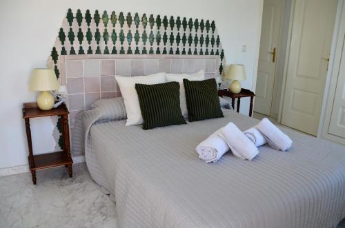 Ένα ή περισσότερα κρεβάτια σε δωμάτιο στο Apartamento Malak