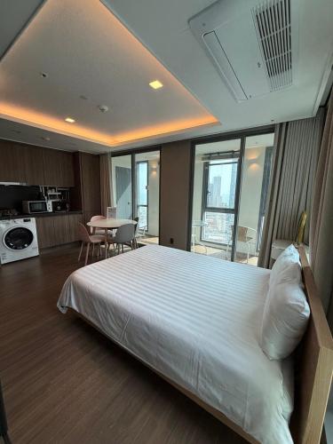 Ένα ή περισσότερα κρεβάτια σε δωμάτιο στο excellent site,family suite room