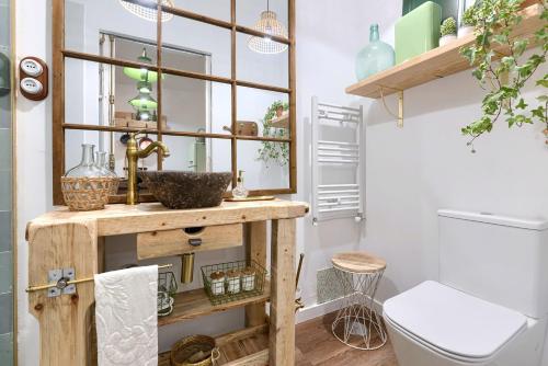 a bathroom with a sink and a toilet at Zamudio Cozy Room By Next Stop Bilbao in Zamudio