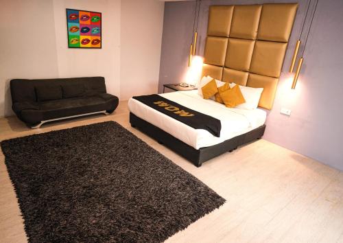 Katil atau katil-katil dalam bilik di Palette Penang Near Georgetown Formerly WOW Hotel