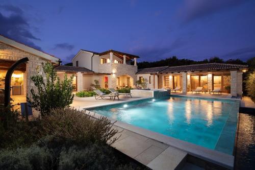 Casa Ginetto near Pula with 45 m2 and extra kids pool, wellness area and game & grill lounge