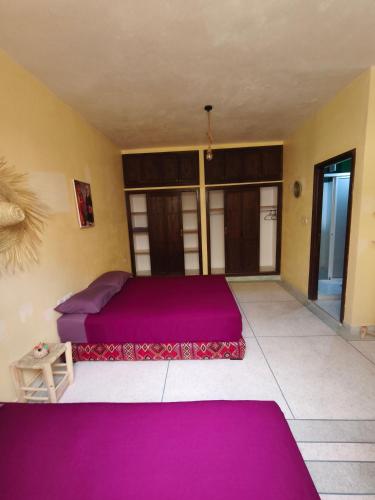 Postel nebo postele na pokoji v ubytování Dar LFarah Agadir & Rooftop