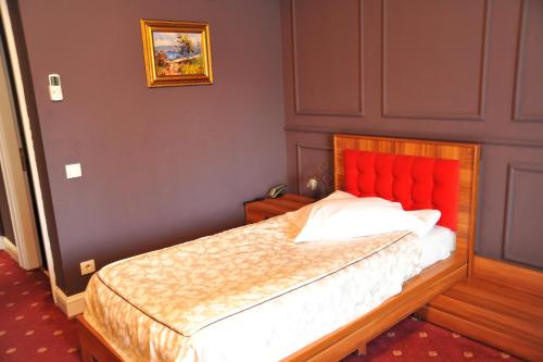 Кровать или кровати в номере Hotel Castel