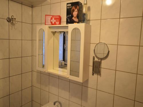 Bilik mandi di Cosy Apartment in Manderscheid with Balcony