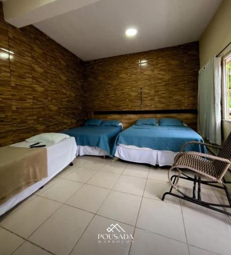 Katil atau katil-katil dalam bilik di pousada marrocos