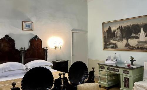 Ένα ή περισσότερα κρεβάτια σε δωμάτιο στο Palazzo De Castro