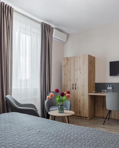 TV a/nebo společenská místnost v ubytování Seven Hills Hotel