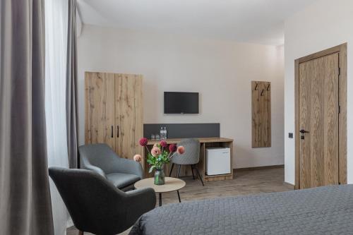 TV a/nebo společenská místnost v ubytování Seven Hills Hotel