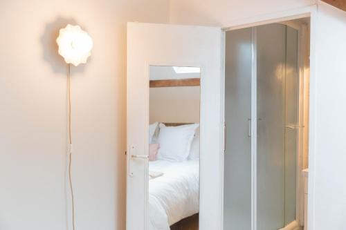 Katil atau katil-katil dalam bilik di Naumad - Guest House