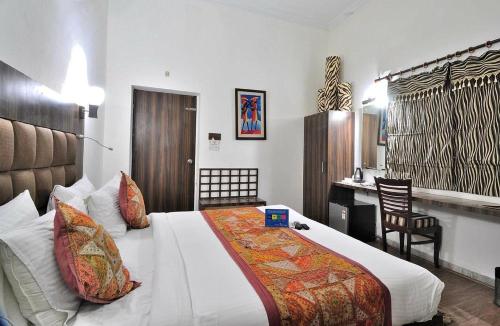 Ένα ή περισσότερα κρεβάτια σε δωμάτιο στο Hotel Best Family Rooms